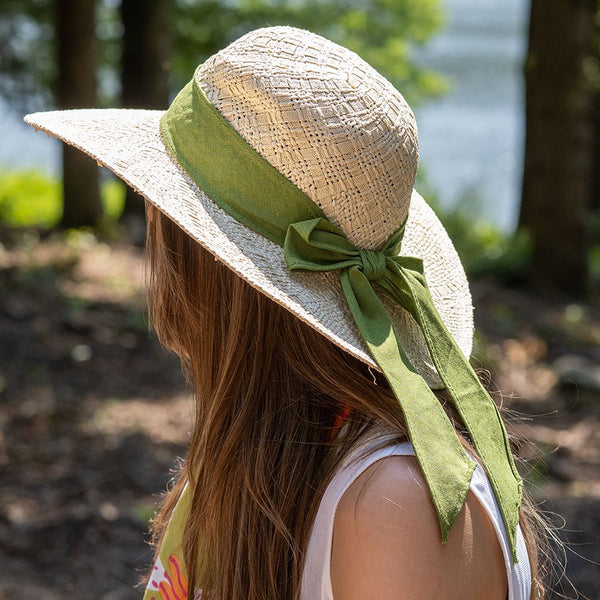 Cream sun hat with green ribbon