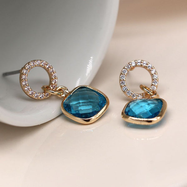 Faux gold plated crystal circle and aqua drop earrings
