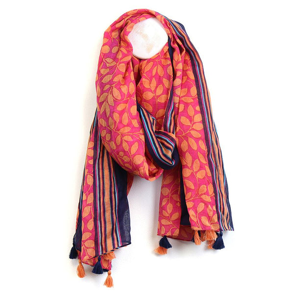 Red and orange leaf print cotton scarf with stripes and tassels