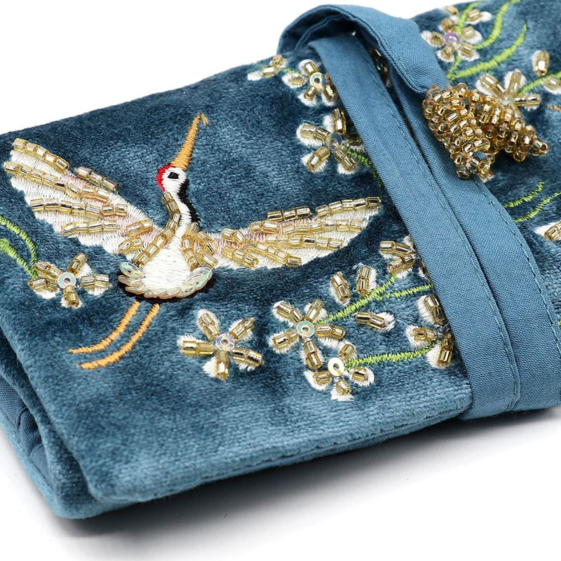 Blue velvet embroidered crane jewellery roll