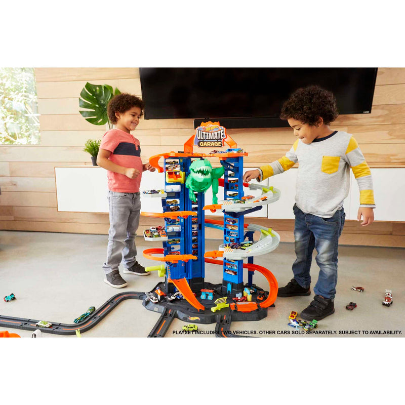Hot Wheels HW Ultimate Garage Playset with 2 Toy Cars, Stores 100+ 1:64  Scale Vehicles